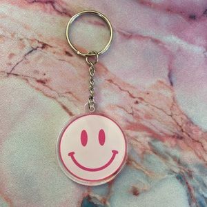 Pink smiley face keychain